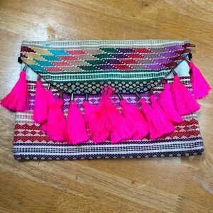 Amor Eterno woven rainbow hot pink tassel clutch bag